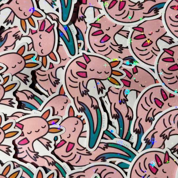 colorful axolotl holographic sticker. it has holographic foil that sparkles in the shape of stars
