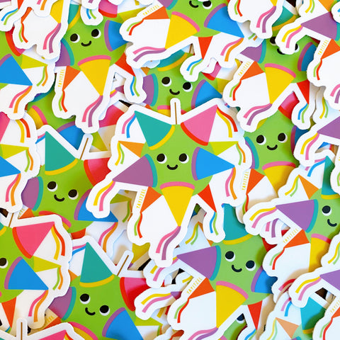 colorful and smiling piñata character sticker. piñata is smiling and looking up.